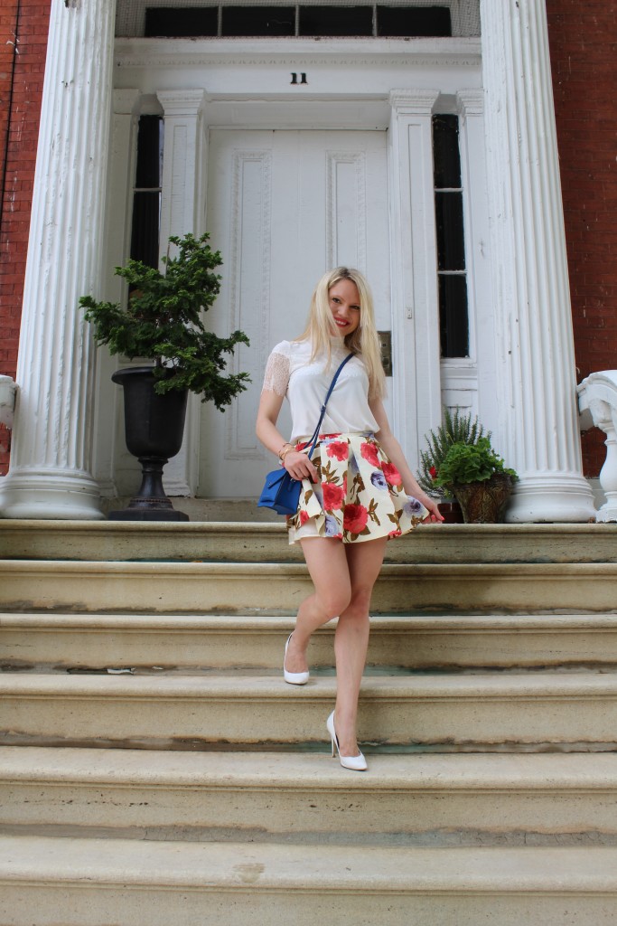 girl in cream coral skirt and white lace top Caitlin Hartley of Styled American