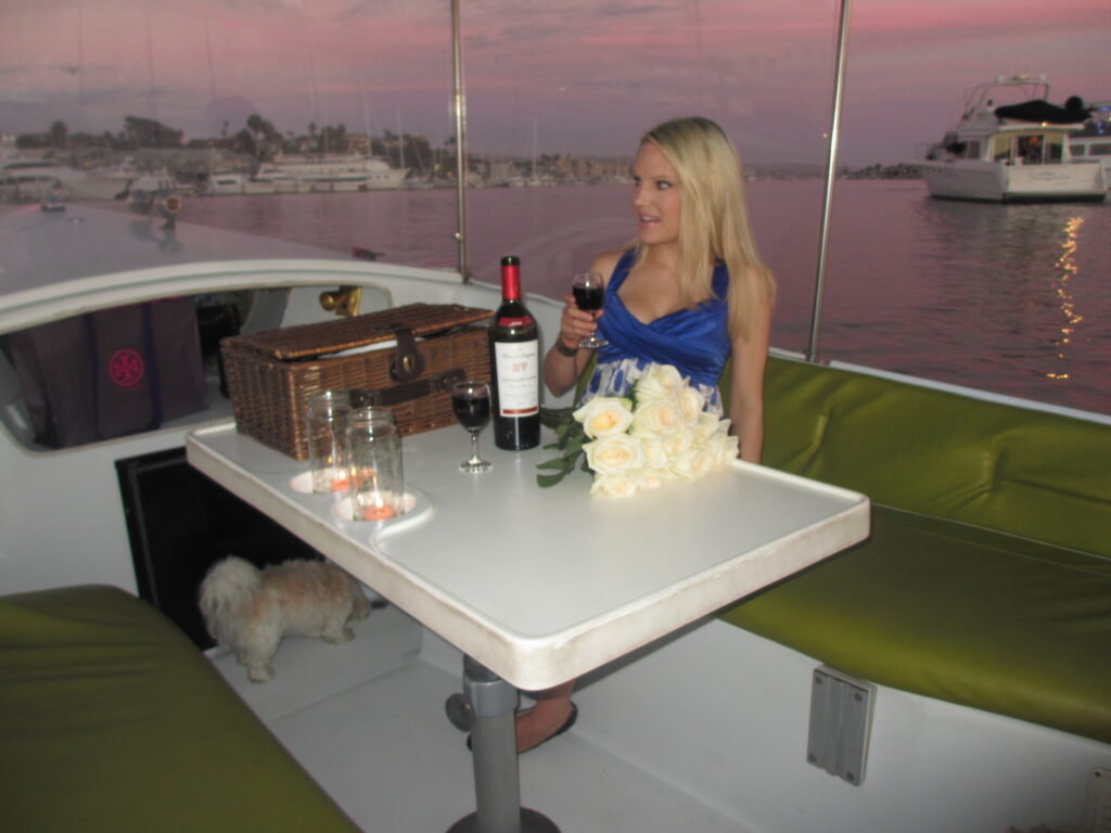 caitlin hartley having a picnic on a duffy boat