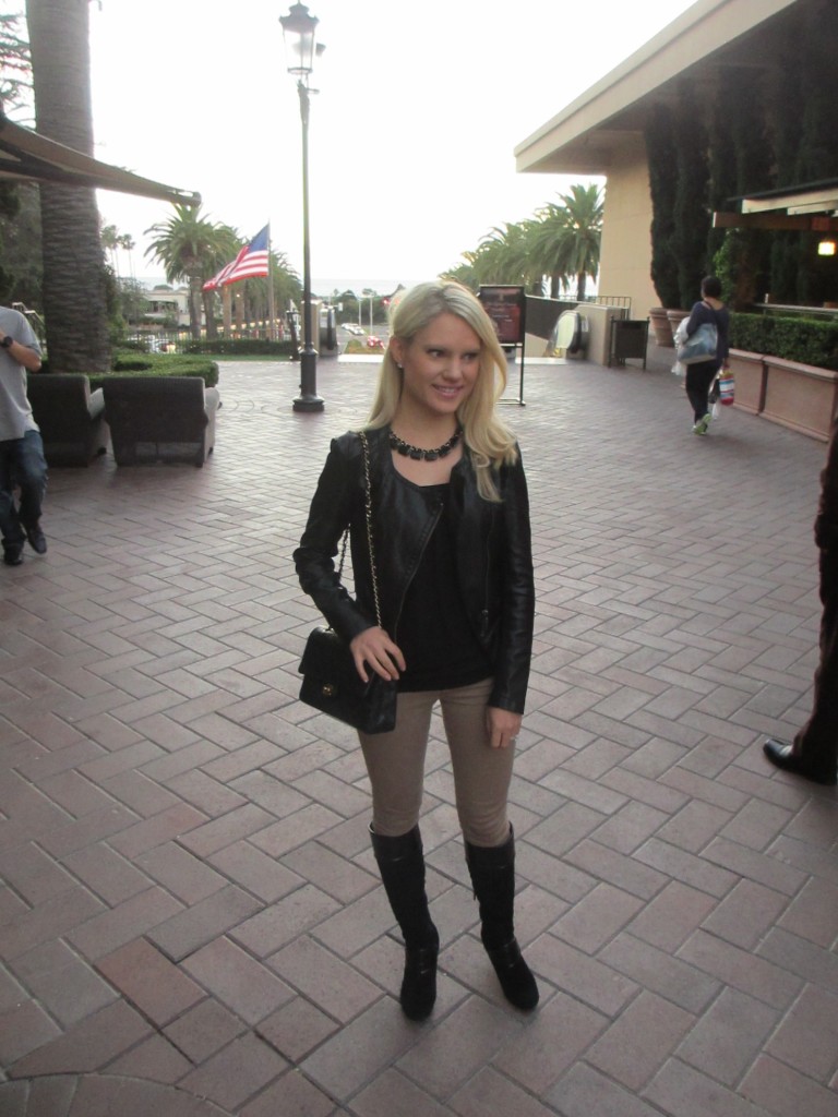 black and nude outfit, black boots, black blaser and chanel bag Caitlin Hartley of Styled American