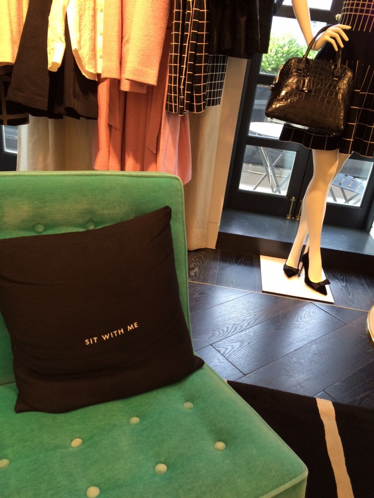 Caitlin Hartley of Styled American sit with me pillow in Kate Spade