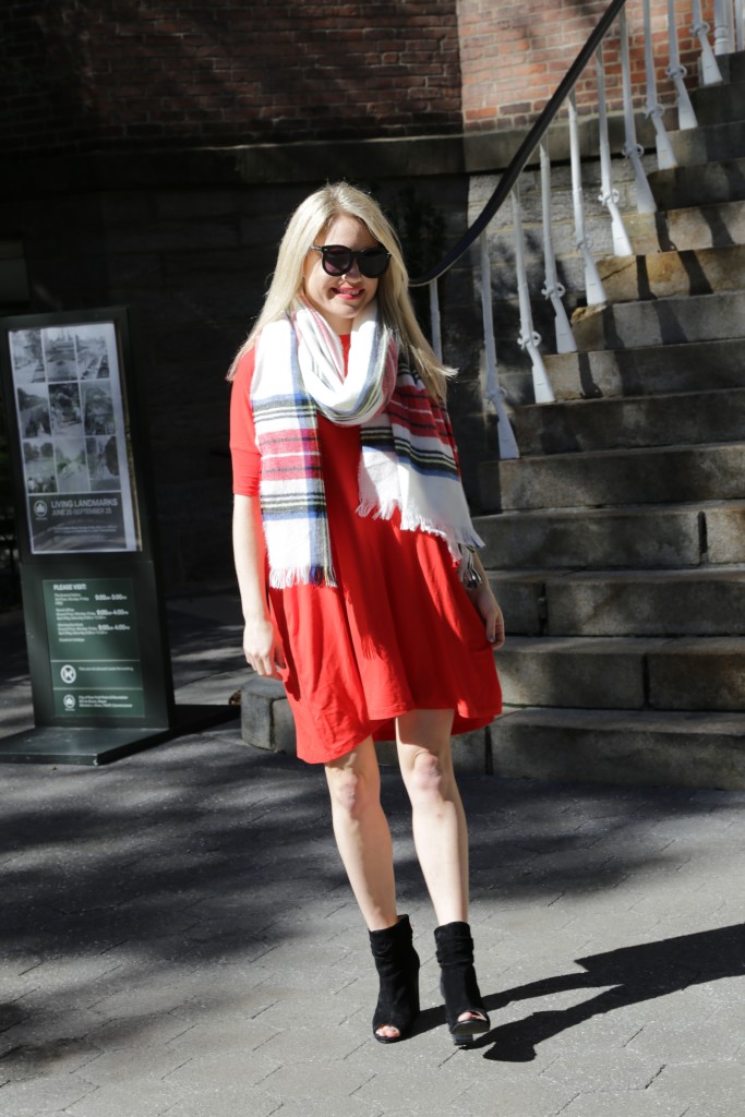 Caitlin Hartley of Styled American red dress, black booties, plaid scarf