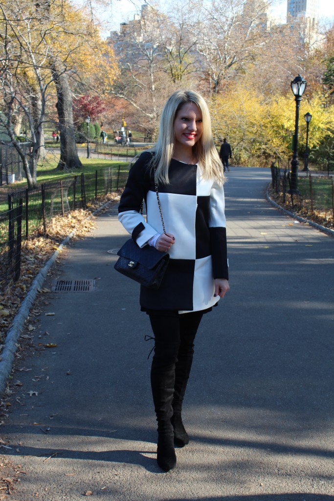 Caitlin Hartley of Styled American black and white coat and over the knee boots
