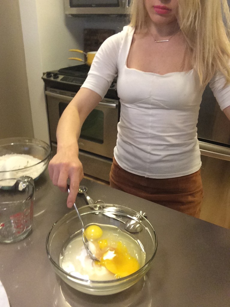 Caitlin Hartley of Styled American mixing eggs with flour