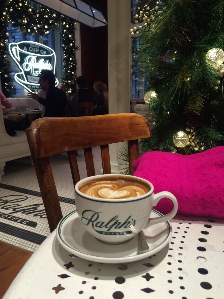 Caitlin Hartley of Styled American Ralphs coffee shop in Ralph Lauren on Fifth Avenue and a pink sweater
