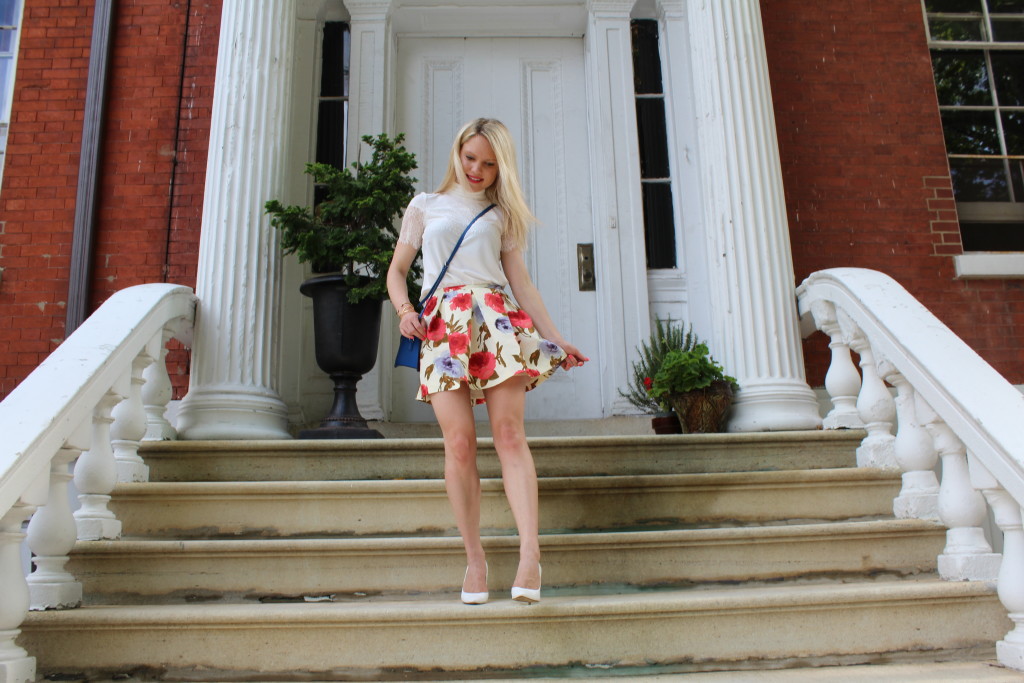 Caitlin Hartley of Styled American, girl walking down steps of a brownstone in floral skirt