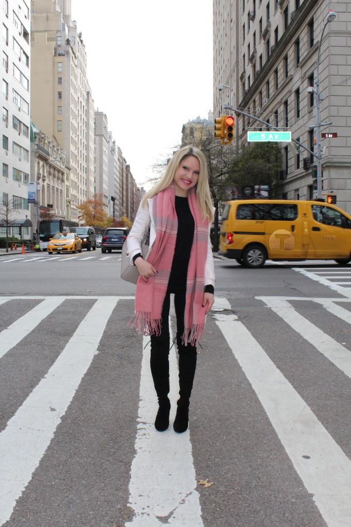 Caitlin Hartley of Styled American pink coat, pink plaid scarf, black skinny pants
