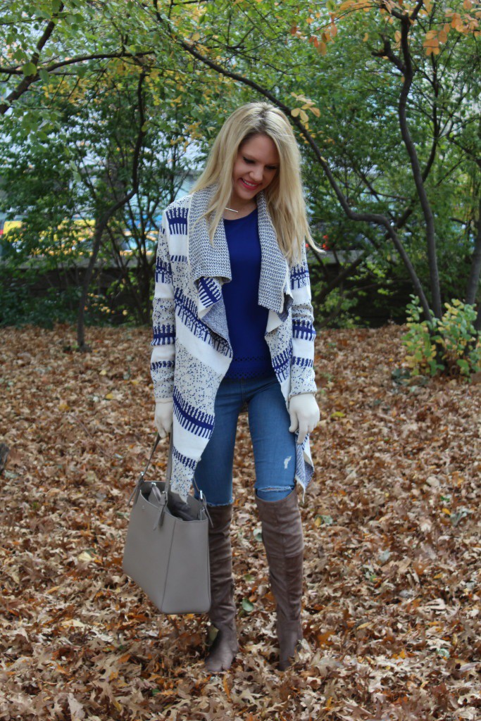 Caitlin Hartley of Styled American royal blue eyelet top, blue and white long cardigan sweater, ripped denim, grey suede boots