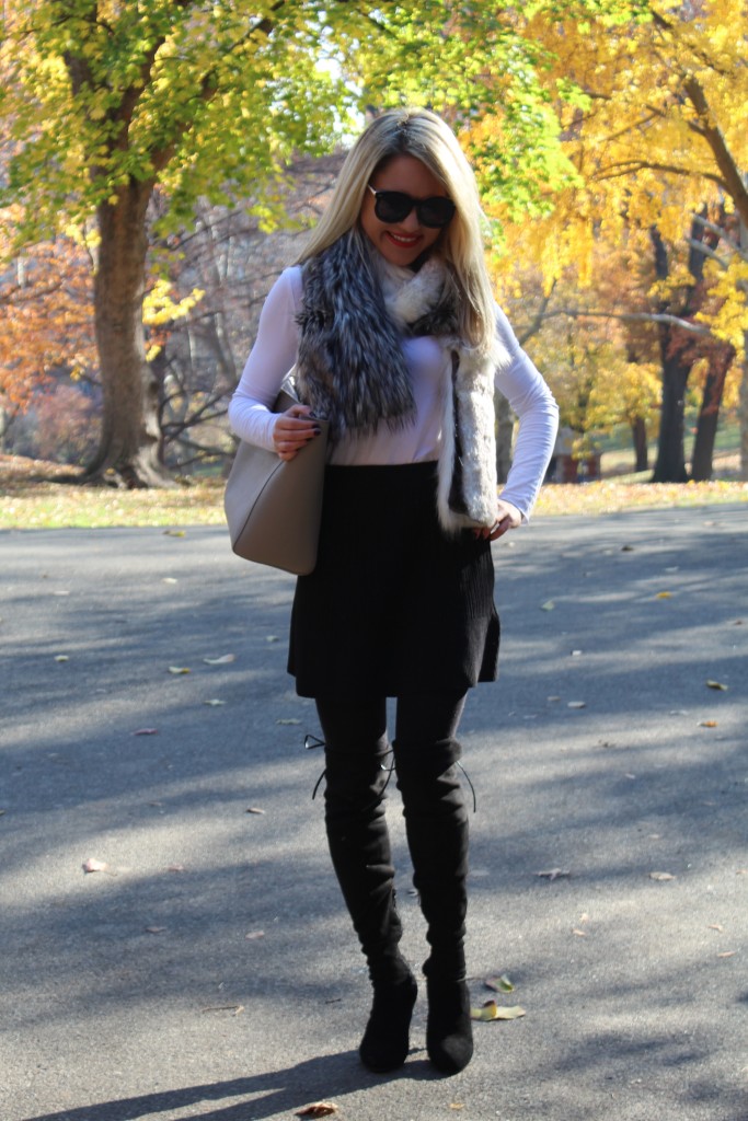 Caitlin Hartley of Styled American grey tote, faux fur scarf, black skirt, black boots