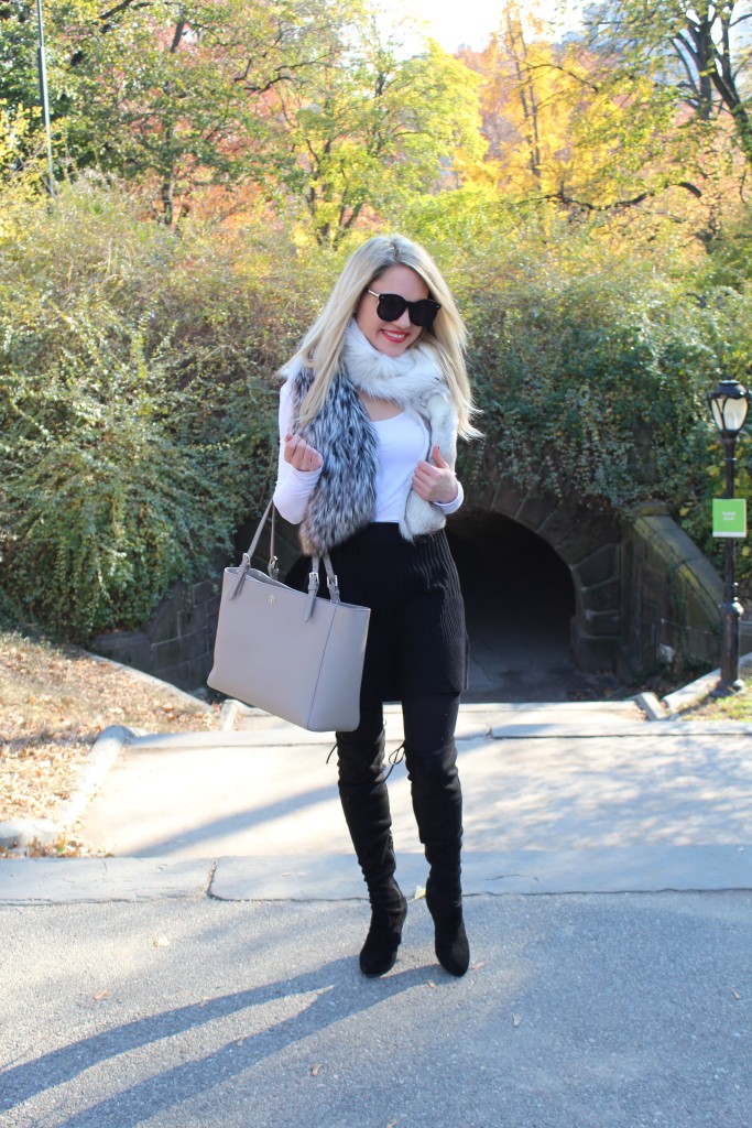 Caitlin Hartley of Styled American faux fur attire, faux fur scarf, grey and black outfit