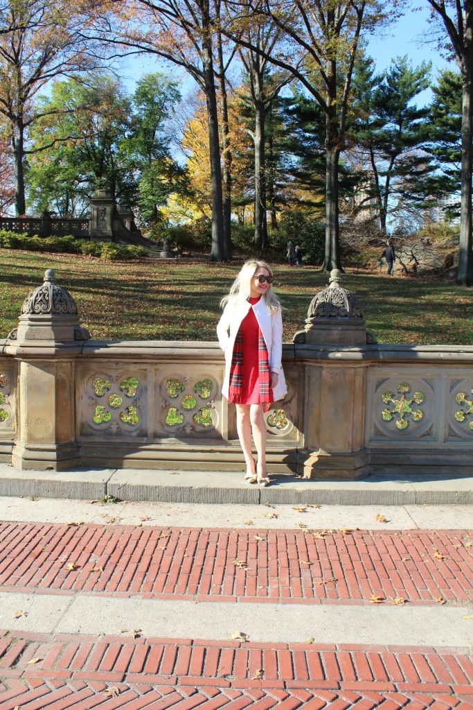 Caitlin Hartley of Styled American red dress, light pink coat, nude bow pumps