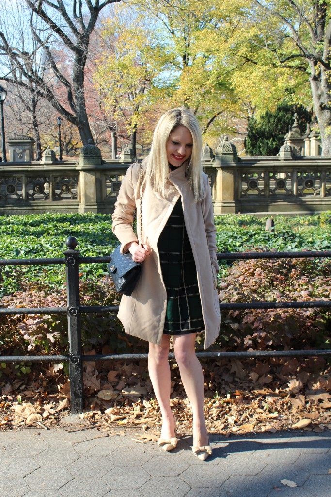 Caitlin Hartley of Styled American emerald green turtleneck dress