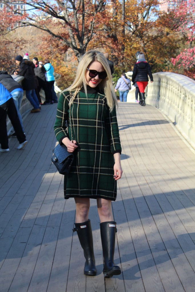 Caitlin Hartley of Styled American, black Hunter boots, green plaid dress