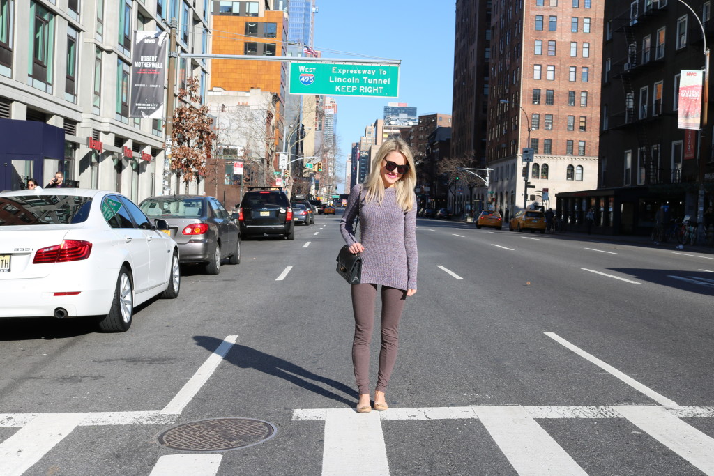 Caitlin Hartley of Styled American girl in cross walk in nyc