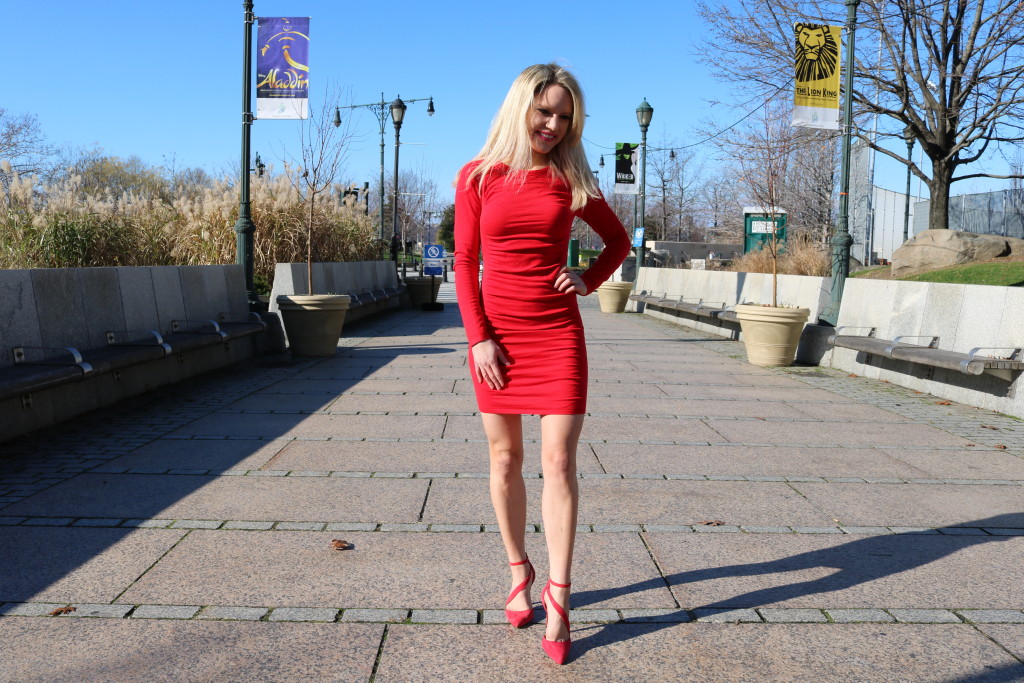 Caitlin Hartley of Styled American red long sleeve dress and red heels