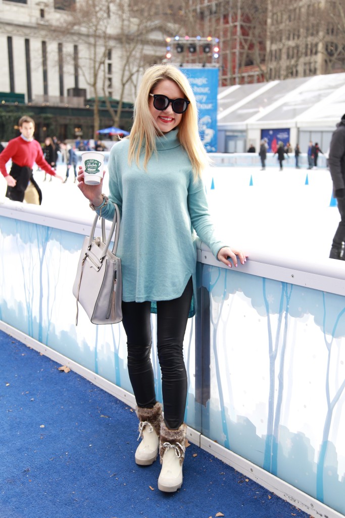 Caitlin Hartley of Styled American long light blue sweater and black leggings