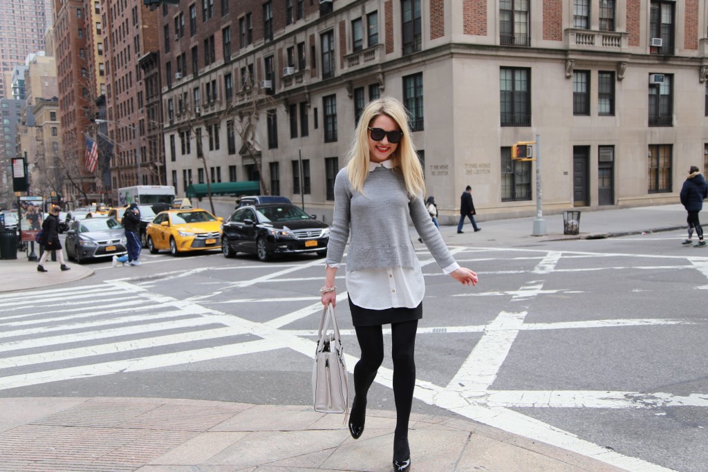 Caitlin Hartley of Styled American girl running through NYC in layered outfit