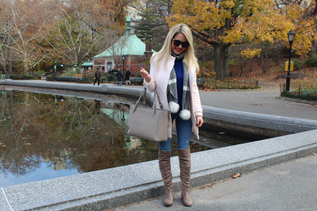 Caitlin Hartley of Styled American pink winter coat and pom pom scarf