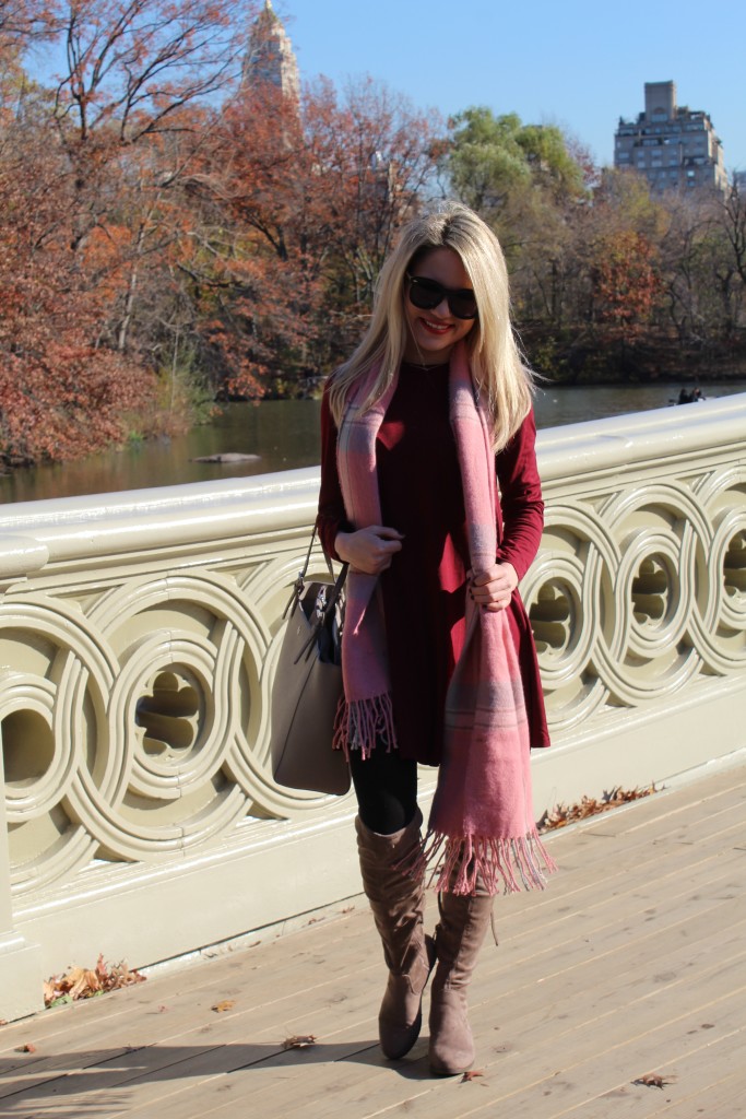 Caitlin Hartley of Styled American fashion blogger on bow bridge in Central Park