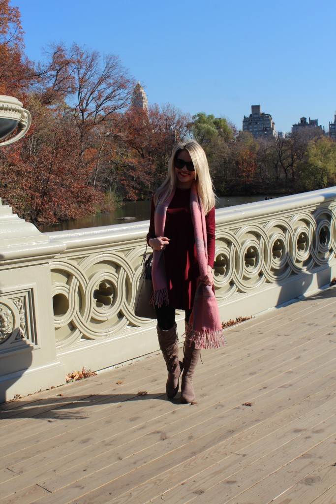 Caitlin Hartley of Styled American burgundy dress, pink plaid scarf, grey tote