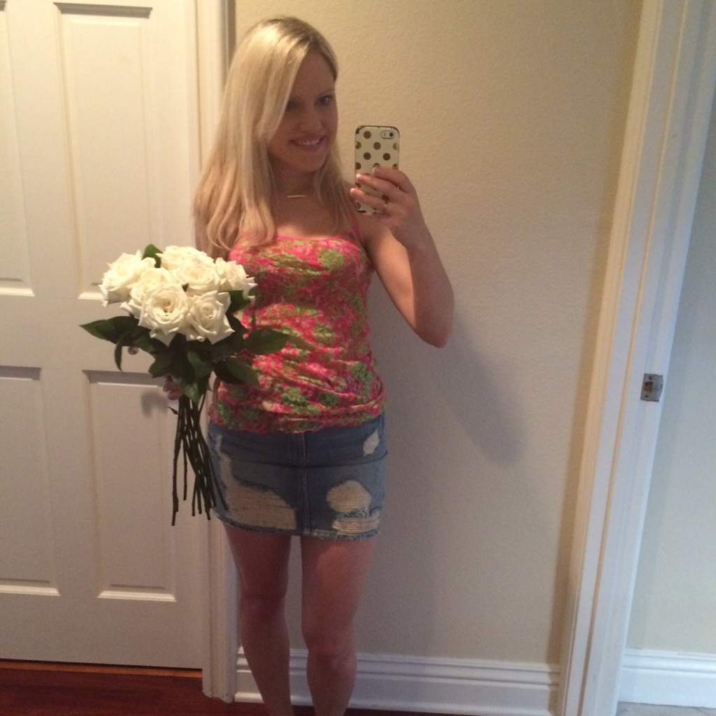 Caitlin Hartley of Styled American lilly pulitzer tank top, ripped denim skirt and white roses