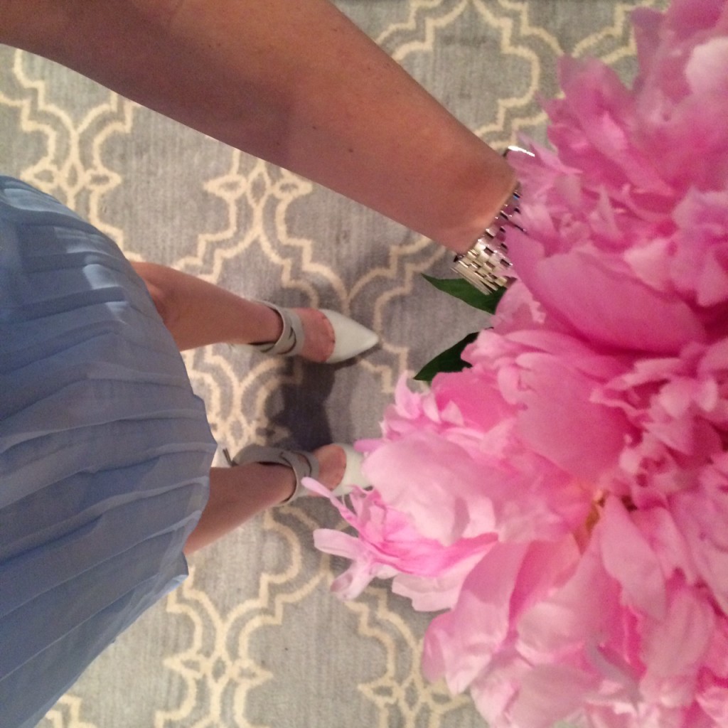 Caitlin Hartley of Styled American fashion blogger view from above, pink peonies
