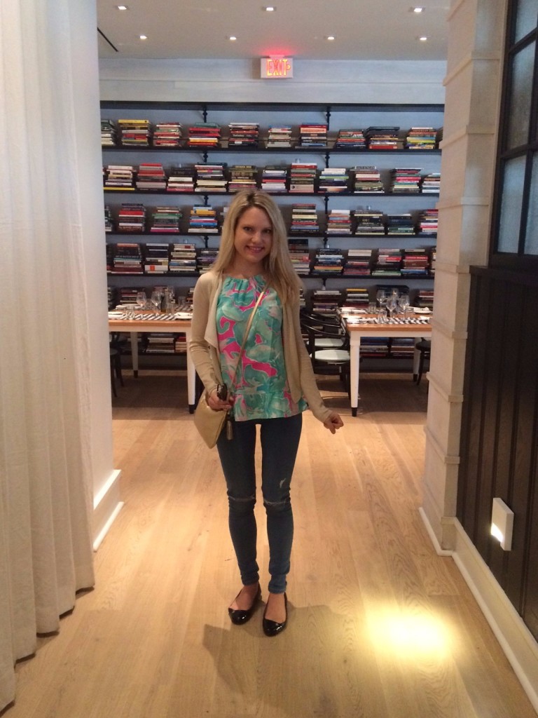 Caitlin Hartley of Styled American girl at The Brice Hotel in front of book cases