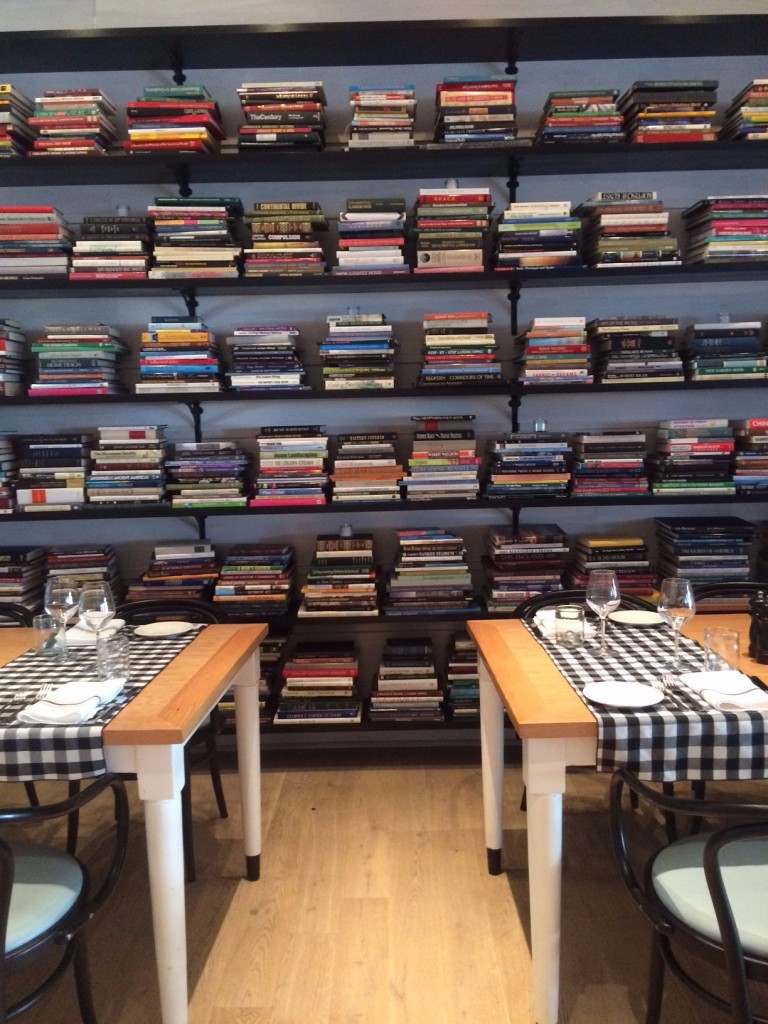 Caitlin Hartley of Styled American tables with gingham table runners and bookshelves decor