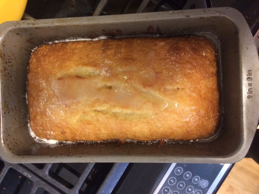 Caitlin Hartley of Styled American baked lemon bread with glaze in loaf pan