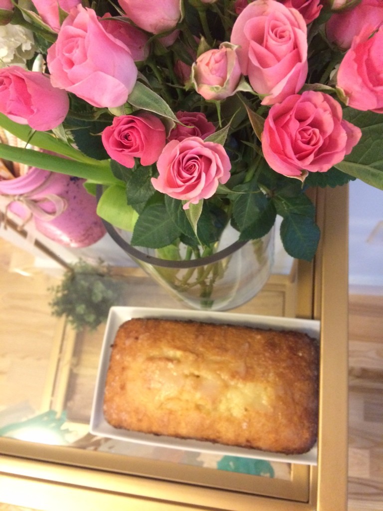 Caitlin Hartley of Styled American pink roses and lemon bread on bar cart