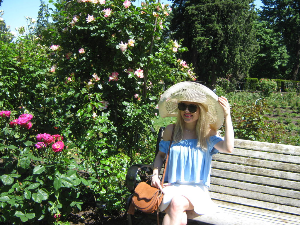 Caitlin-Hartley-of-Styled-American-floppy-hat-blue-off-the-shoulder-top-white-skirt-wedges