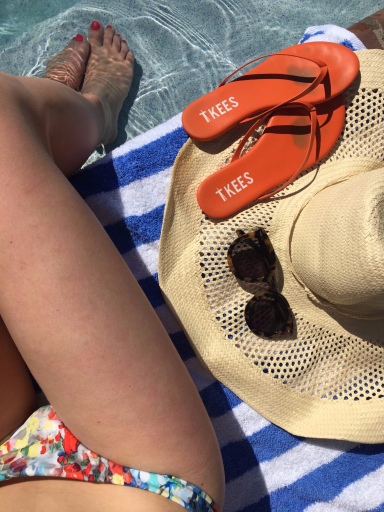 Caitlin-Hartley-of-Styled-American-poolside-girl-in-bikini-tkees-sunhat-sunglasses