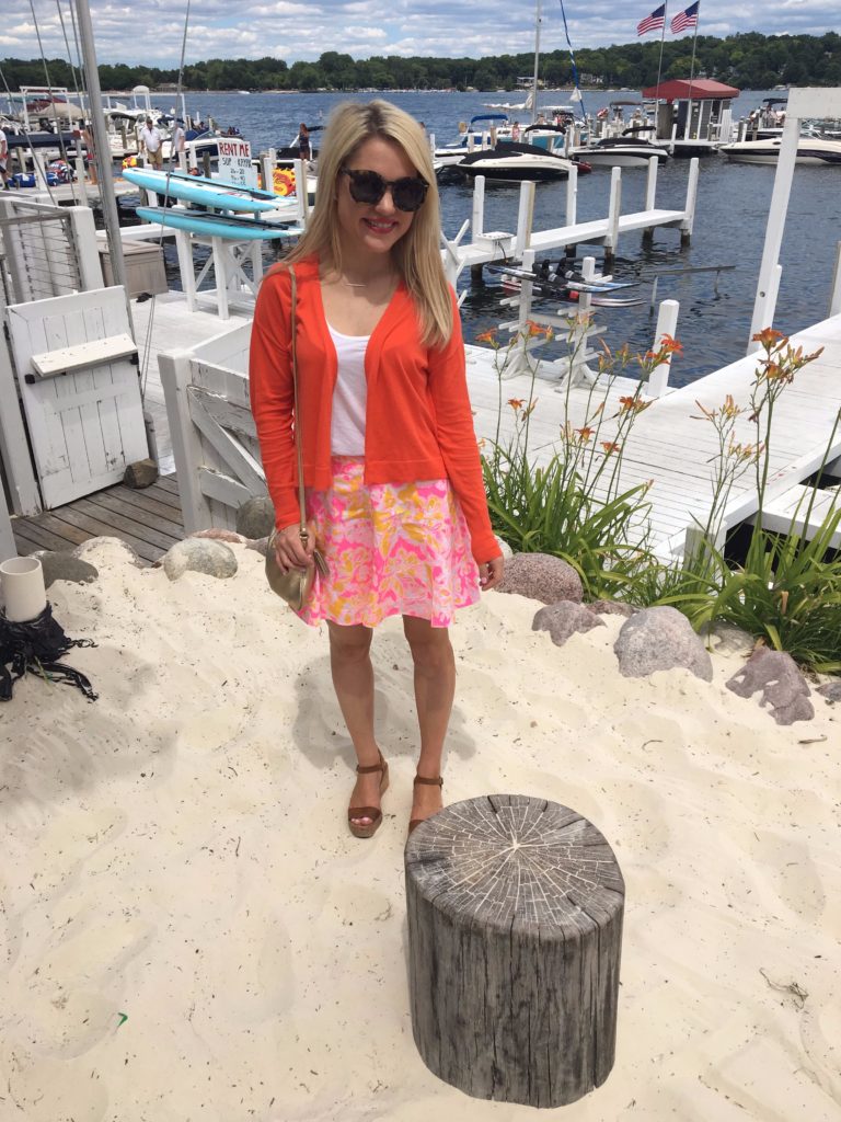 Caitlin-Hartley-of-Styled-American-at-lake-geneva-in-lilly-pulitzer-skirt-and-red-cardigan