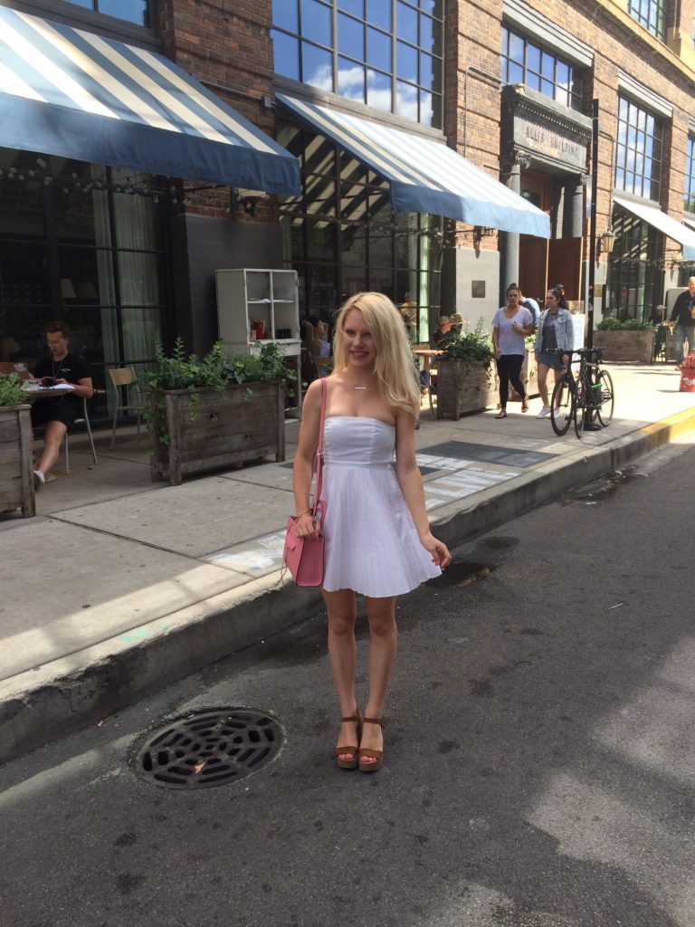 girl-in-white-dress-in-front-of-allis-hotel-chicago