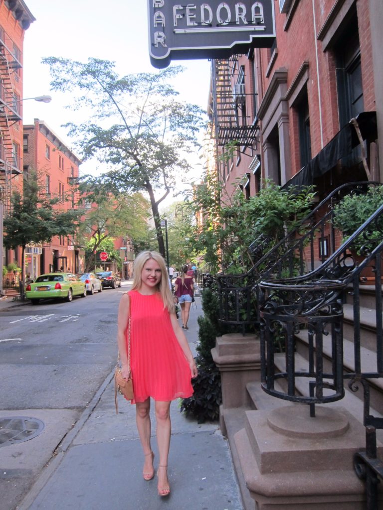 west-village-wearing-pleated-dress