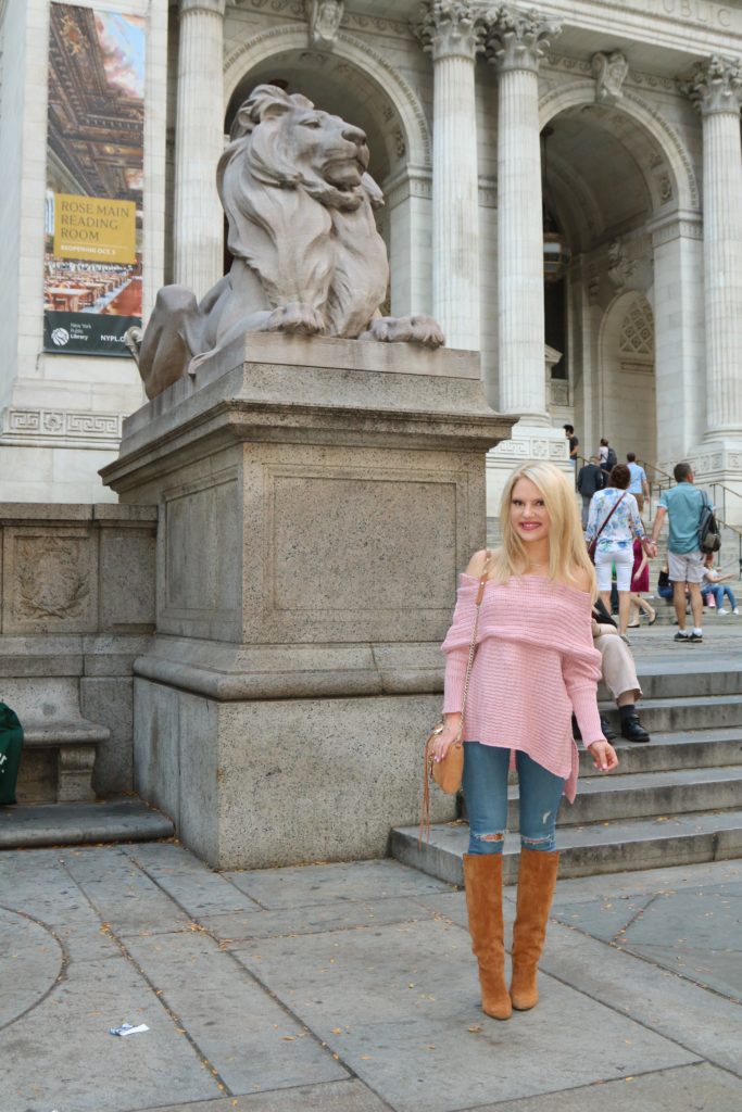 in-front-of-nyc-library-pink-fall-outfit http://styledamerican.com/my-favorite-sweater/