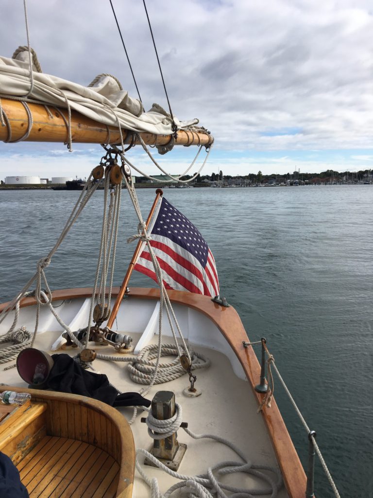 portland-maine-sailboat-american-flag http://styledamerican.com/sailing-in-portland/