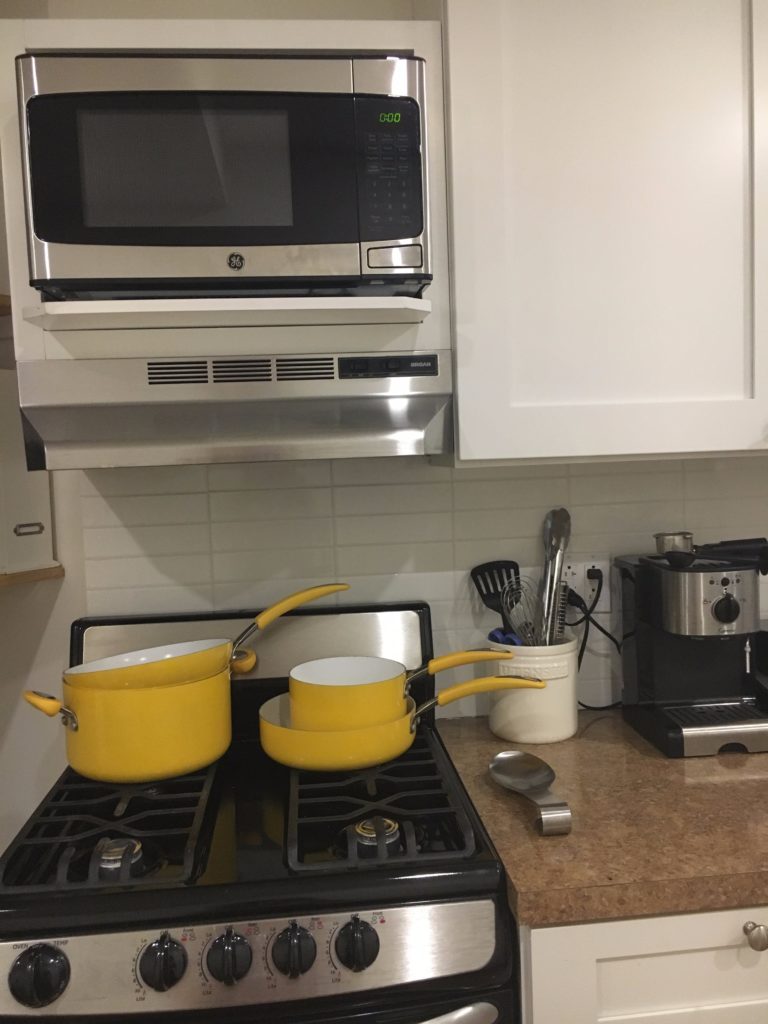 yellow-cookware http://styledamerican.com/my-kitchen/