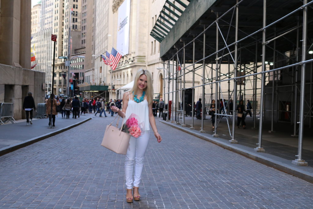 all white outfit with a pop of teal